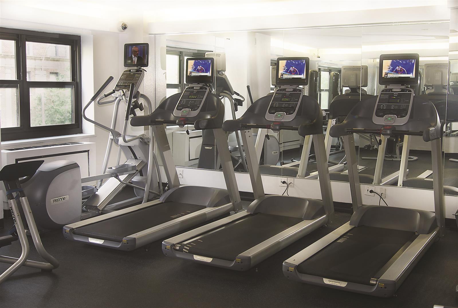 200 East 72nd Street, Unit 22D Manhattan, NY 10021 - Photo 2 of 10 a view of a room with gym equipment