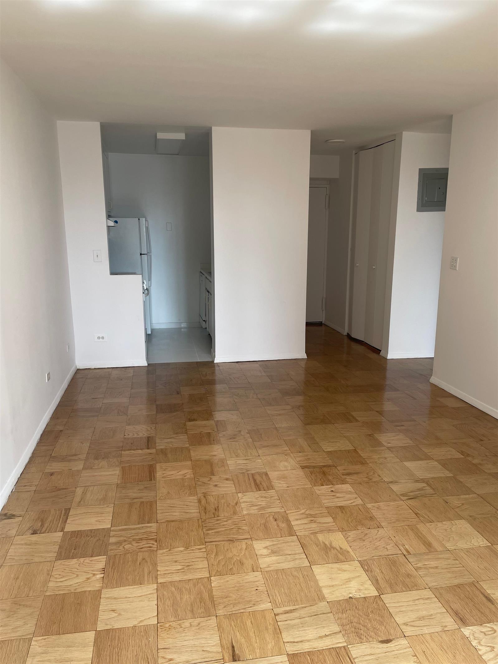 200 East 72nd Street, Unit 22D Manhattan, NY 10021 - Photo 10 of 10 a view of an empty room