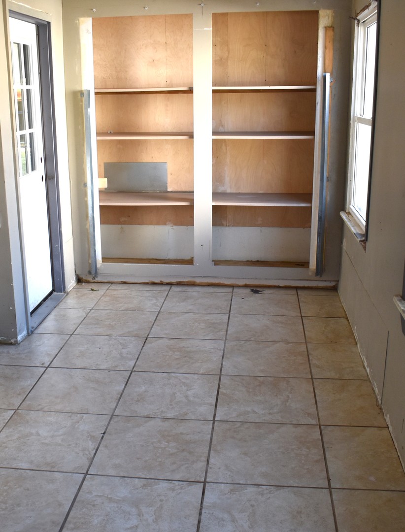 1650 Marquette Road Joliet, IL 60435 - Photo 11 of 20 a view of a room with an empty space and window