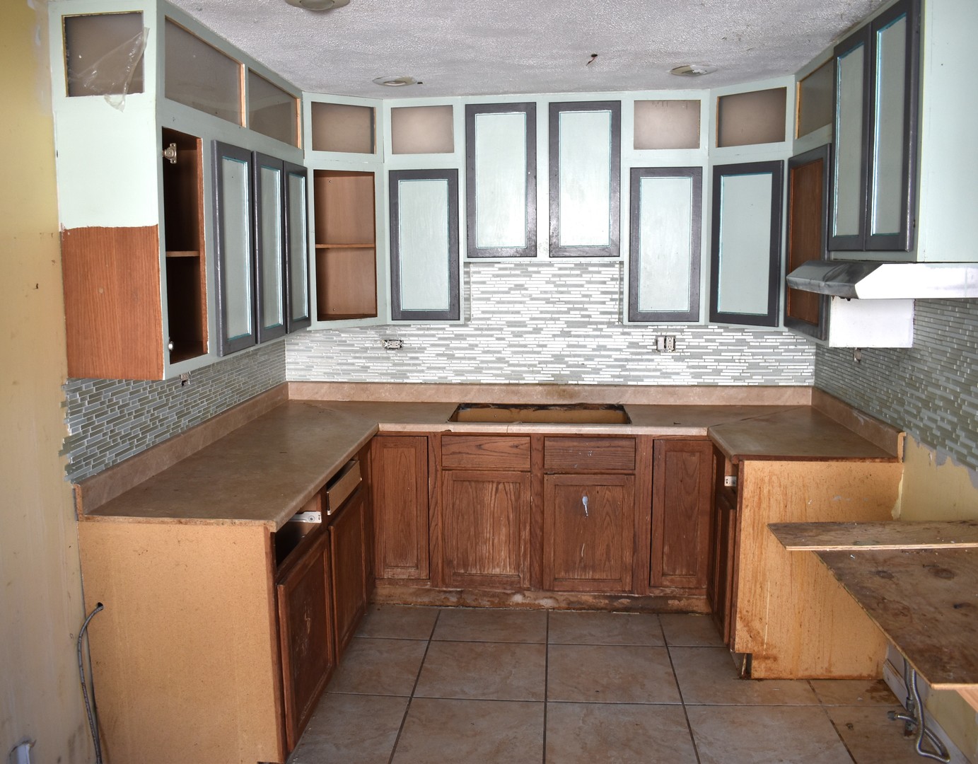 1650 Marquette Road Joliet, IL 60435 - Photo 10 of 20 a kitchen with stainless steel appliances granite countertop a sink and a stove
