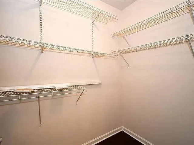 a view of a room with racks on the wall