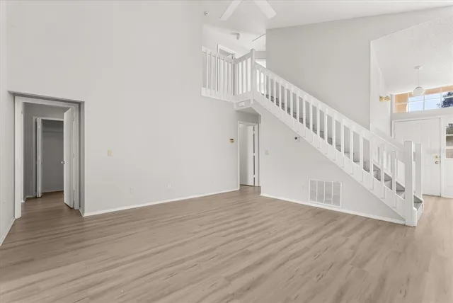 a view of entryway with wooden floor