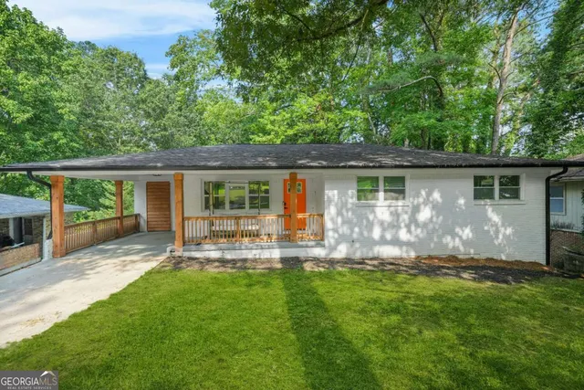 front view of a house with a yard