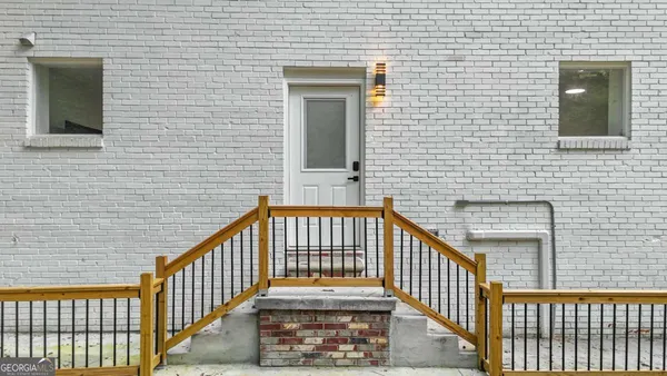 a view of a brick house with a window