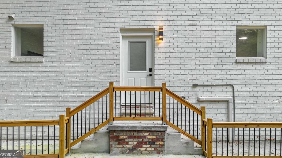 2430 Hanford Drive Southwest Atlanta, GA 30315 - Photo 3 of 21 a view of a brick house with a window