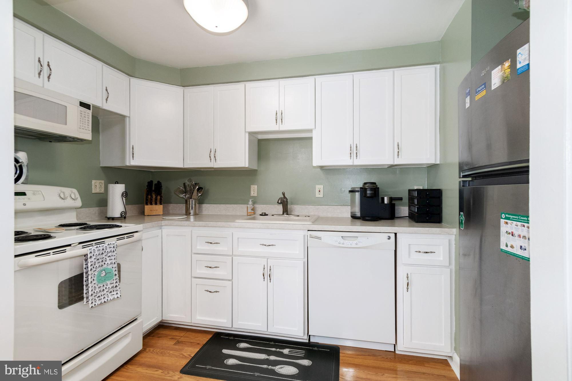 3300 Spartan Road, Unit 1J Olney, MD 20832 - Photo 11 of 24 Kitchen cabinets