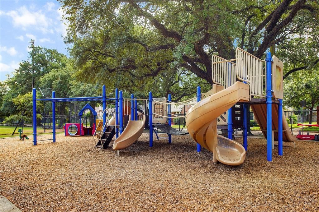 1002 West Cottage Street Houston, TX 77009 - Photo 36 of 37 Proctor Plaza offers a well-maintained playground surrounded by mature trees and open green space. Designed for outdoor enjoyment with room to play, relax, and connect. This nearby park adds to the everyday convenience of the Heights lifestyle.