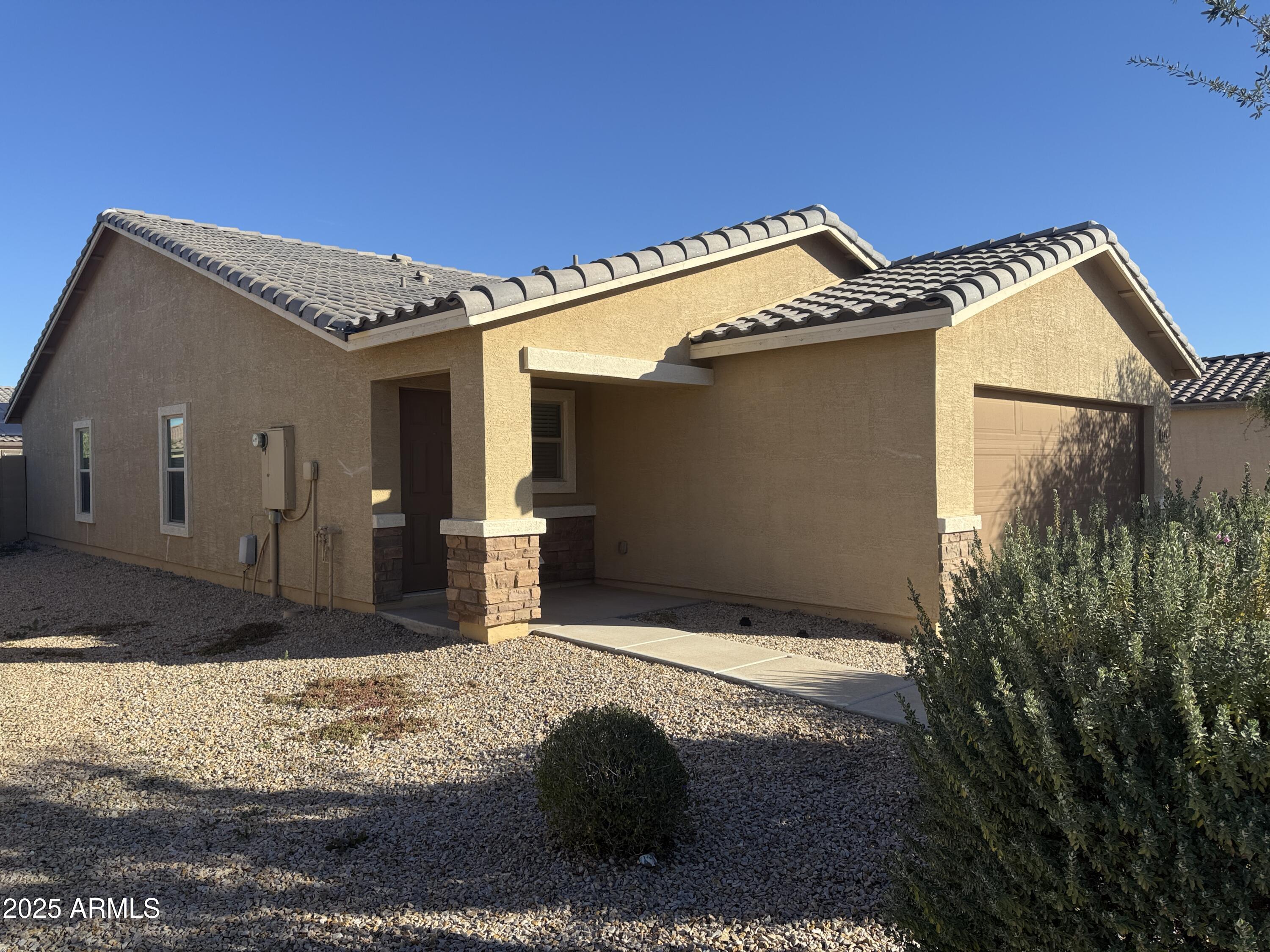 944 Starview Avenue Coolidge, AZ 85128 - Photo 1 of 36 a backyard of a house