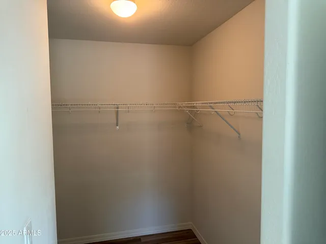 a view of a room with racks on the wall