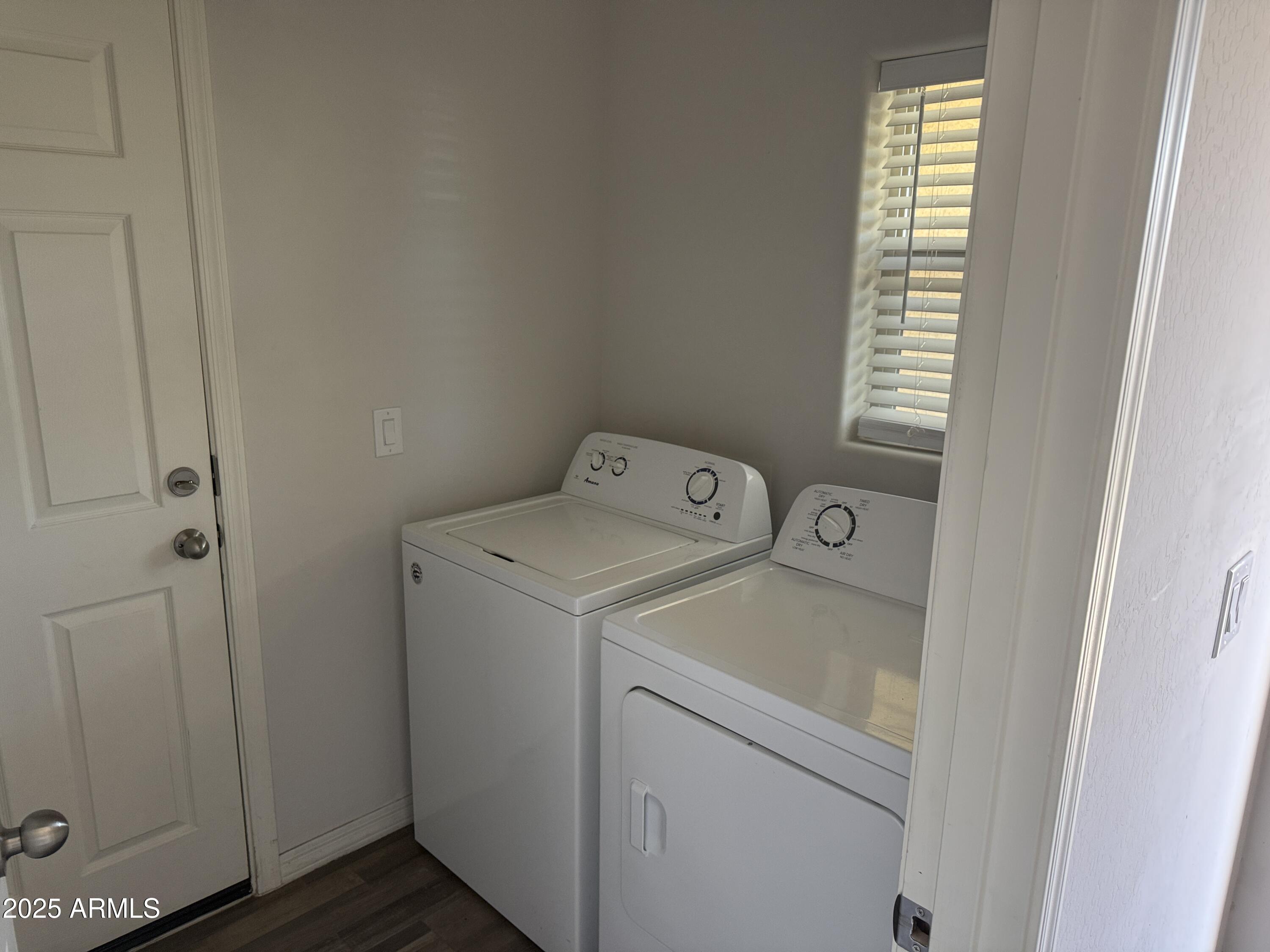 944 Starview Avenue Coolidge, AZ 85128 - Photo 24 of 36 a utility room with dryer and washer