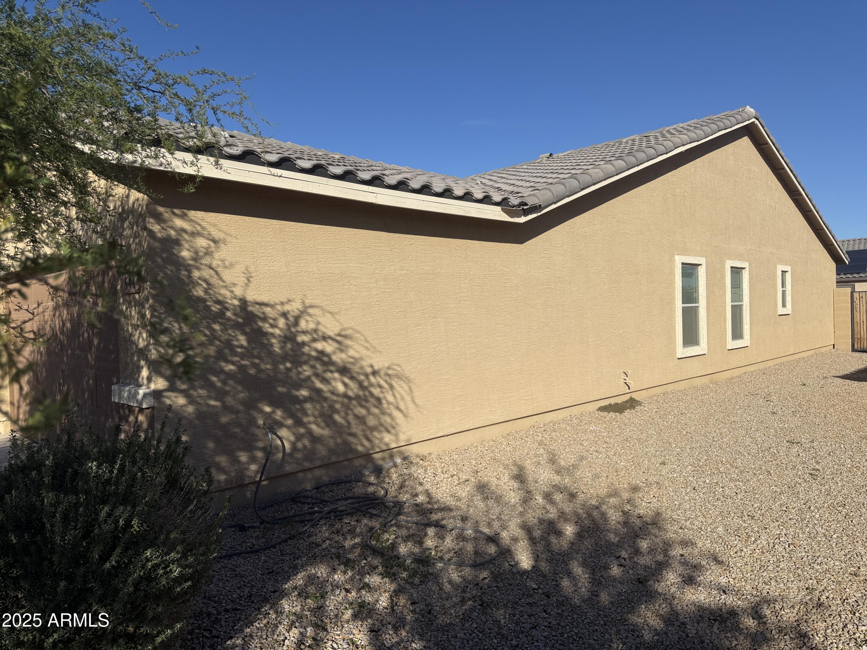 944 Starview Avenue Coolidge, AZ 85128 - Photo 31 of 36 a view of a house with a tree
