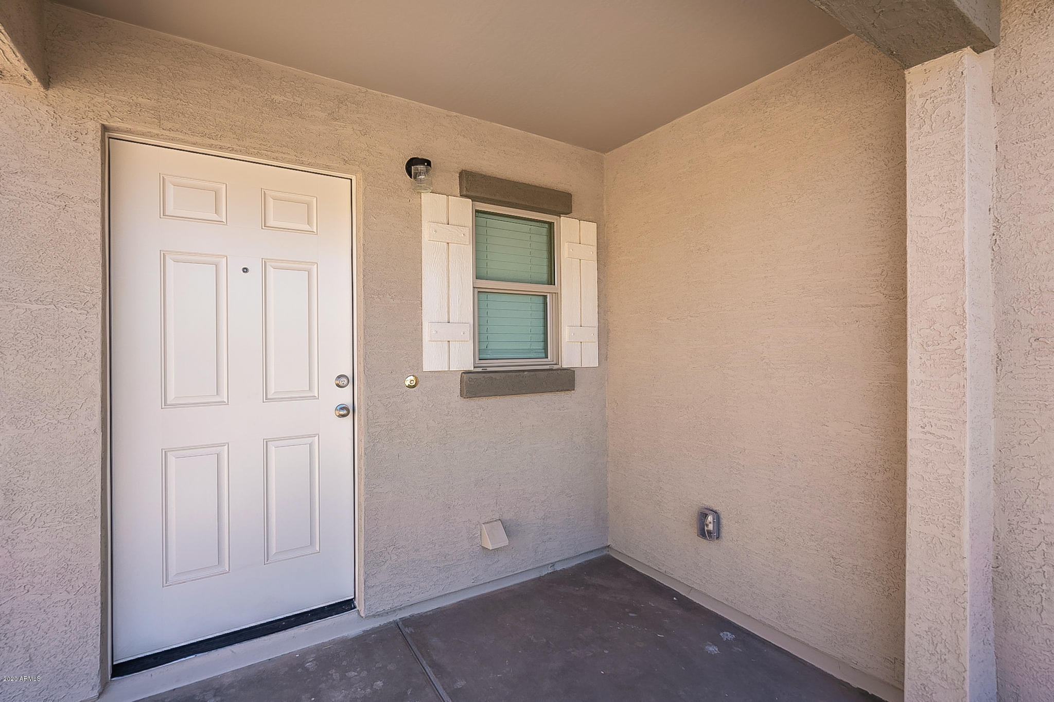 944 Starview Avenue Coolidge, AZ 85128 - Photo 3 of 36 an empty room with windows