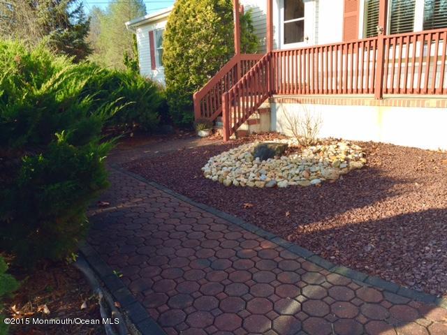 454 Freehold Road Jackson, NJ 08527 - Photo 8 of 18 a view of a porch with a yard