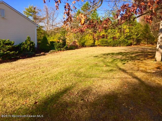 454 Freehold Road Jackson, NJ 08527 - Photo 9 of 18 a view of yard with swimming pool and green space
