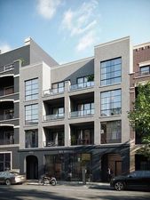 a front view of residential houses with street