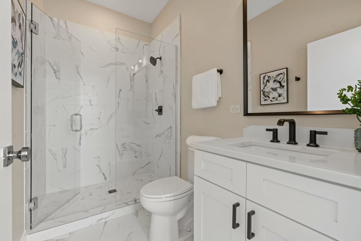 Undisclosed Address Chicago, IL 60657 - Photo 21 of 22 a bathroom with a granite countertop sink toilet and shower