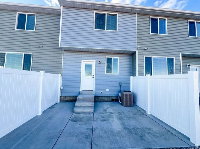 522 West 2000 South Vernal, UT 84078 - Photo 3 of 18 Rear view of property featuring a patio and entry steps