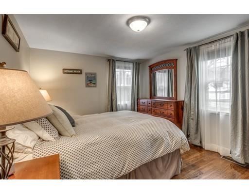 108 Chesbrough Road Boston, MA 02132 - Photo 16 of 22 a bedroom with a large bed and a large window