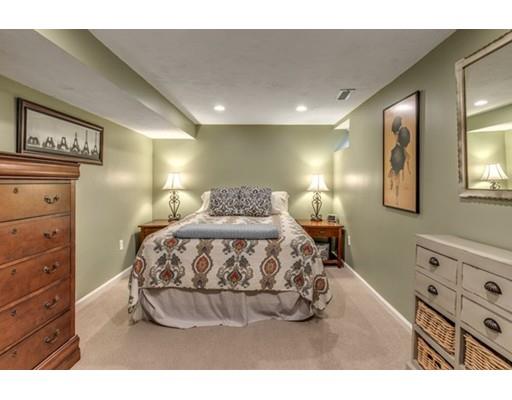 108 Chesbrough Road Boston, MA 02132 - Photo 20 of 22 a bedroom with a bed and a night stand
