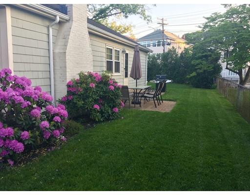 108 Chesbrough Road Boston, MA 02132 - Photo 2 of 22 a view of a house with a backyard and sitting area