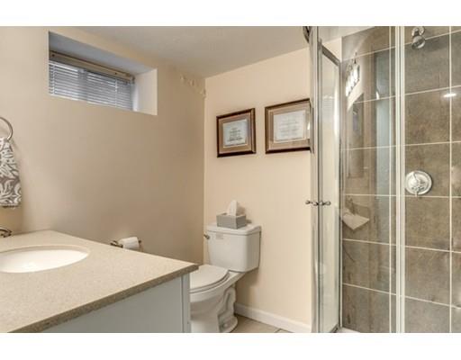 108 Chesbrough Road Boston, MA 02132 - Photo 22 of 22 a bathroom with a sink toilet and shower