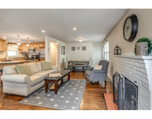 108 Chesbrough Road Boston, MA 02132 - Photo 4 of 22 a living room with furniture a fireplace