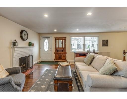 108 Chesbrough Road Boston, MA 02132 - Photo 5 of 22 a living room with furniture and a fireplace