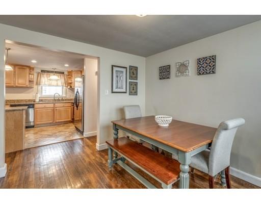 108 Chesbrough Road Boston, MA 02132 - Photo 8 of 22 a view of a dining room with furniture and wooden floor