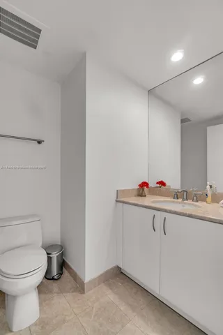 a bathroom with a sink and a toilet