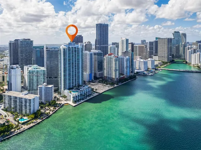 a view of a city with tall buildings