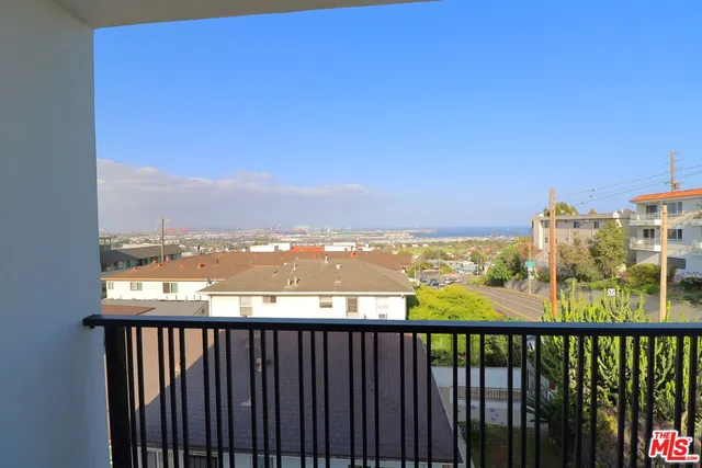a view of city from a balcony