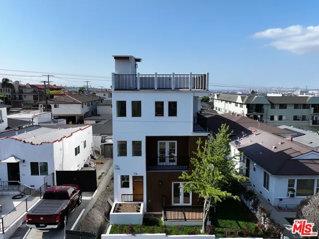 a view of city with tall buildings