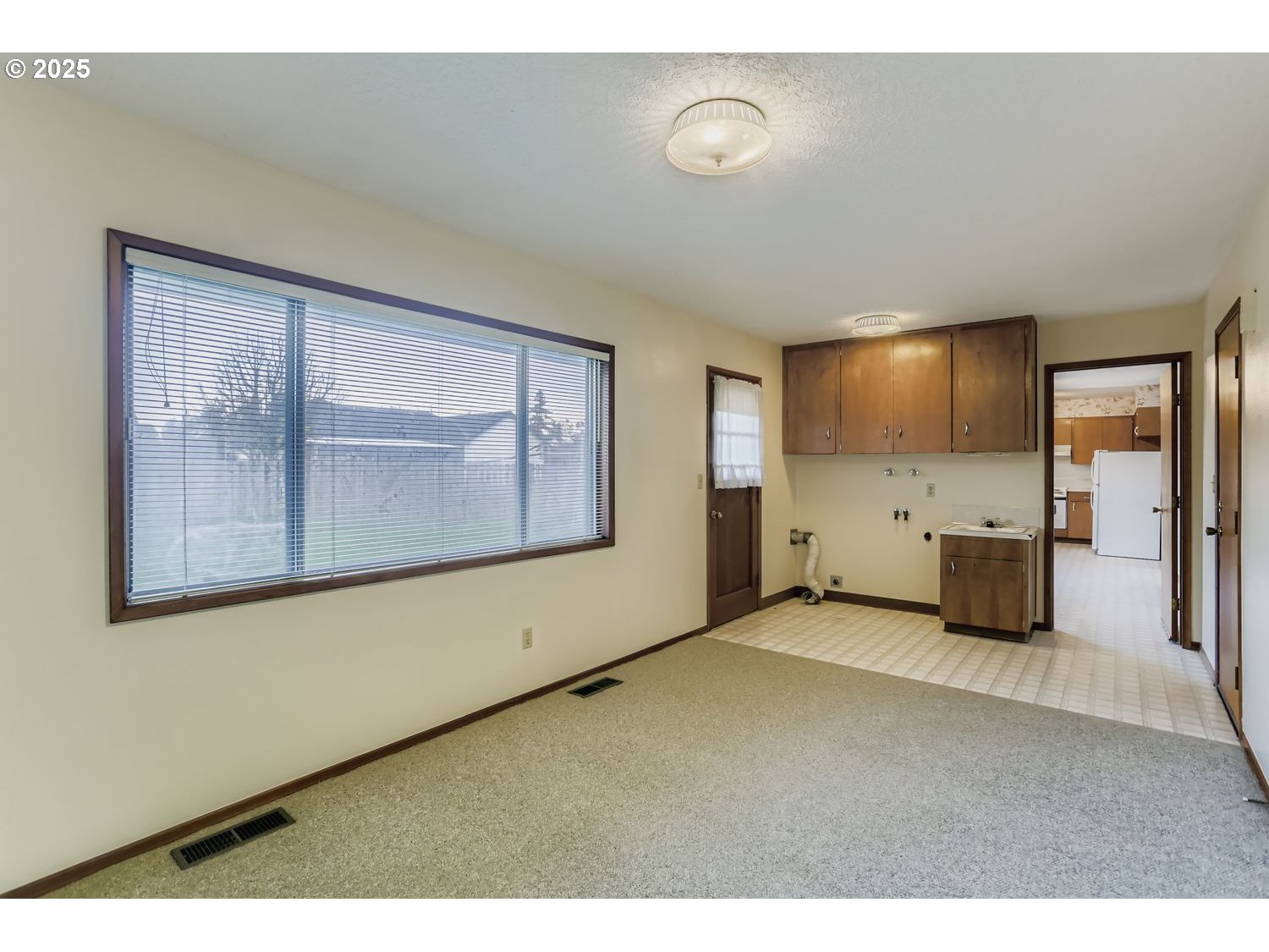 1134 South Ginger Street Cornelius, OR 97113 - Photo 14 of 25 a view of an empty room with a window