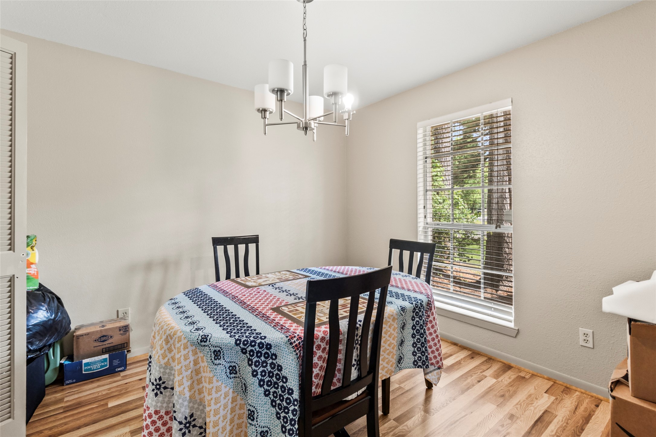 1 East Woodtimber Court Spring, TX 77381 - Photo 5 of 16 a view of a dining room with furniture window and outside view