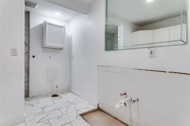 a view of small space with racks on the wall