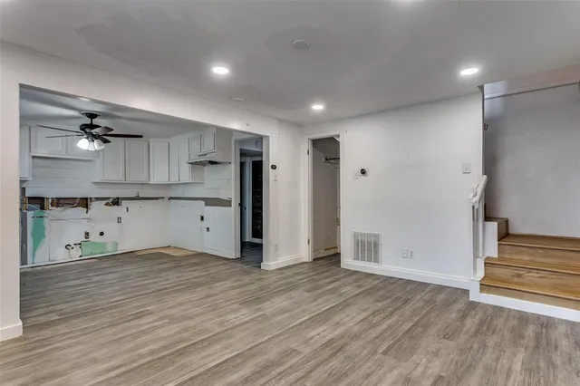 a view of kitchen with wooden floor