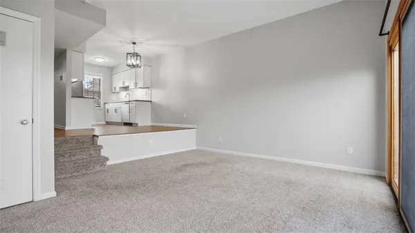 a balcony with wooden floor