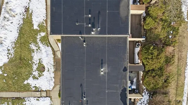 a picture of a city with a lake view