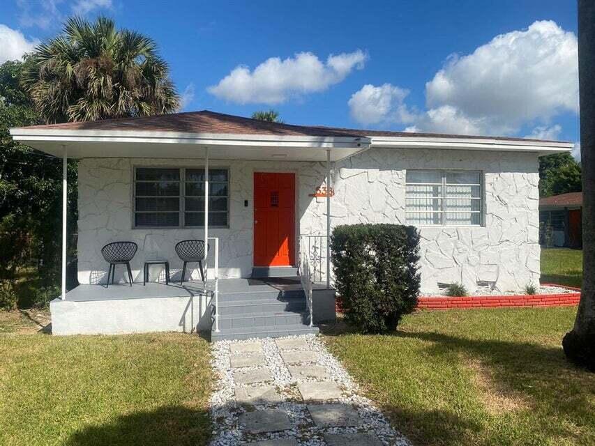 a front view of a house with patio