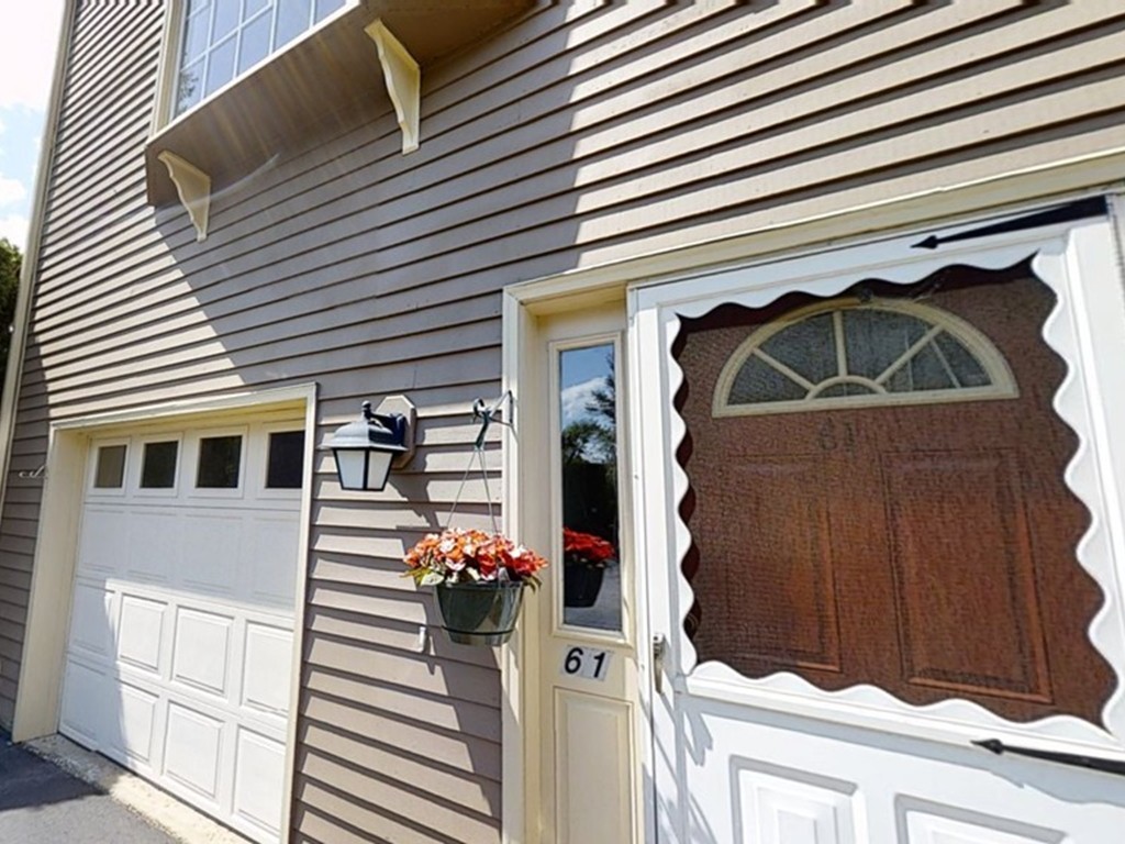 61 Heritage Drive, Unit 61 Tewksbury, MA 01876 - Photo 2 of 35 a view of front door and house