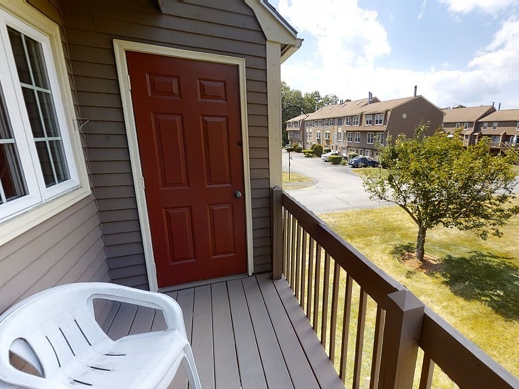 61 Heritage Drive, Unit 61 Tewksbury, MA 01876 - Photo 22 of 35 a view of balcony with furniture