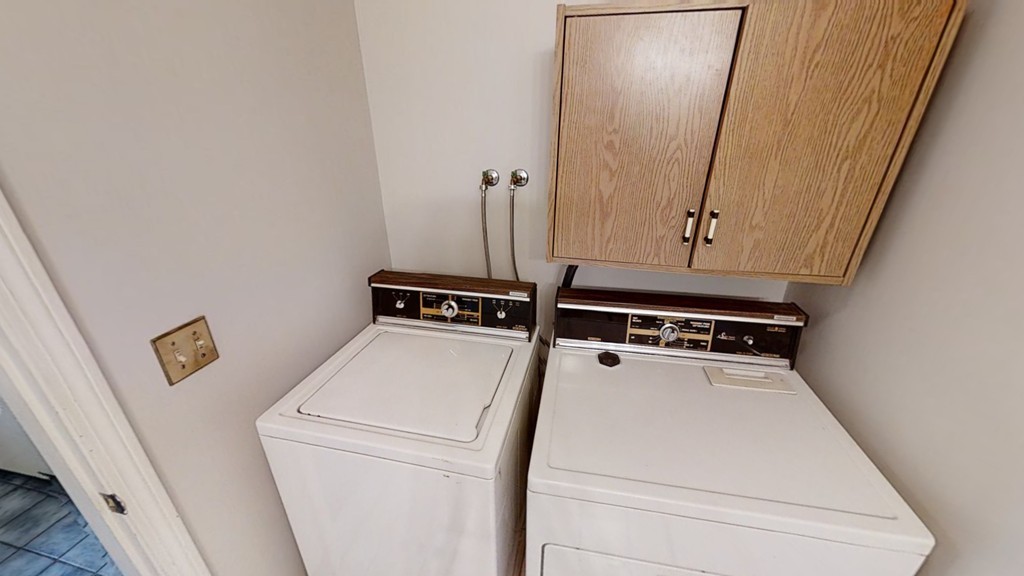 61 Heritage Drive, Unit 61 Tewksbury, MA 01876 - Photo 26 of 35 a utility room with dryer and washer