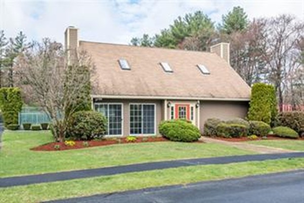 61 Heritage Drive, Unit 61 Tewksbury, MA 01876 - Photo 31 of 35 a view of a house with a yard