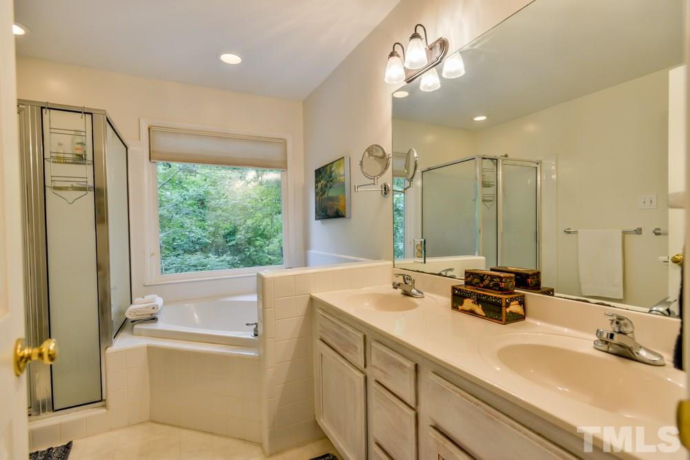 377 Booth Road Chapel Hill, NC 27516 - Photo 14 of 22 Brightly and naturally lit master bath offers an amazing view from the garden tub.