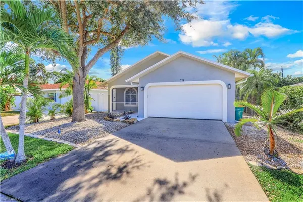 $971,800 | 718 95th Avenue North, Naples, FL 34108