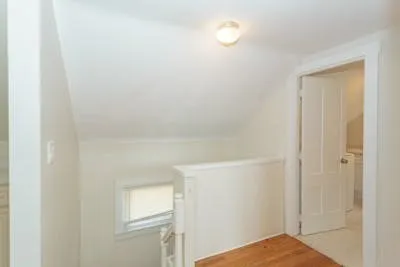 a kitchen with stainless steel appliances granite countertop a refrigerator a stove a sink and a microwave