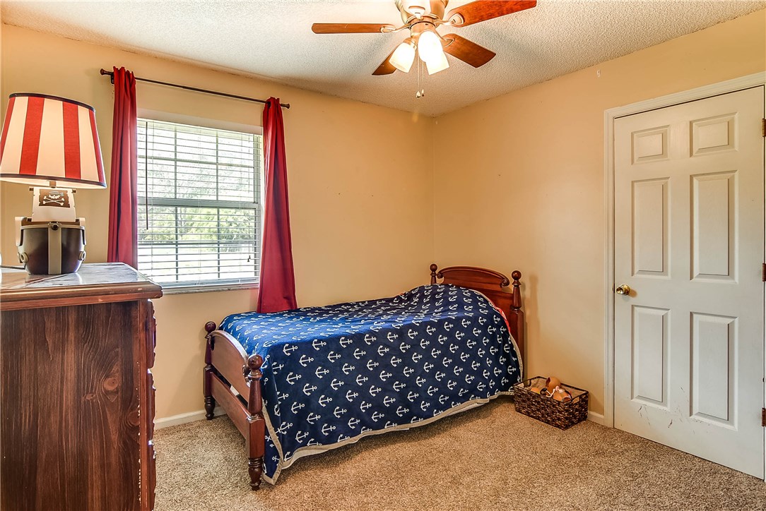 54014 Vikki Road Callahan, FL 32011 - Photo 17 of 29 a bed room with a bed and a window