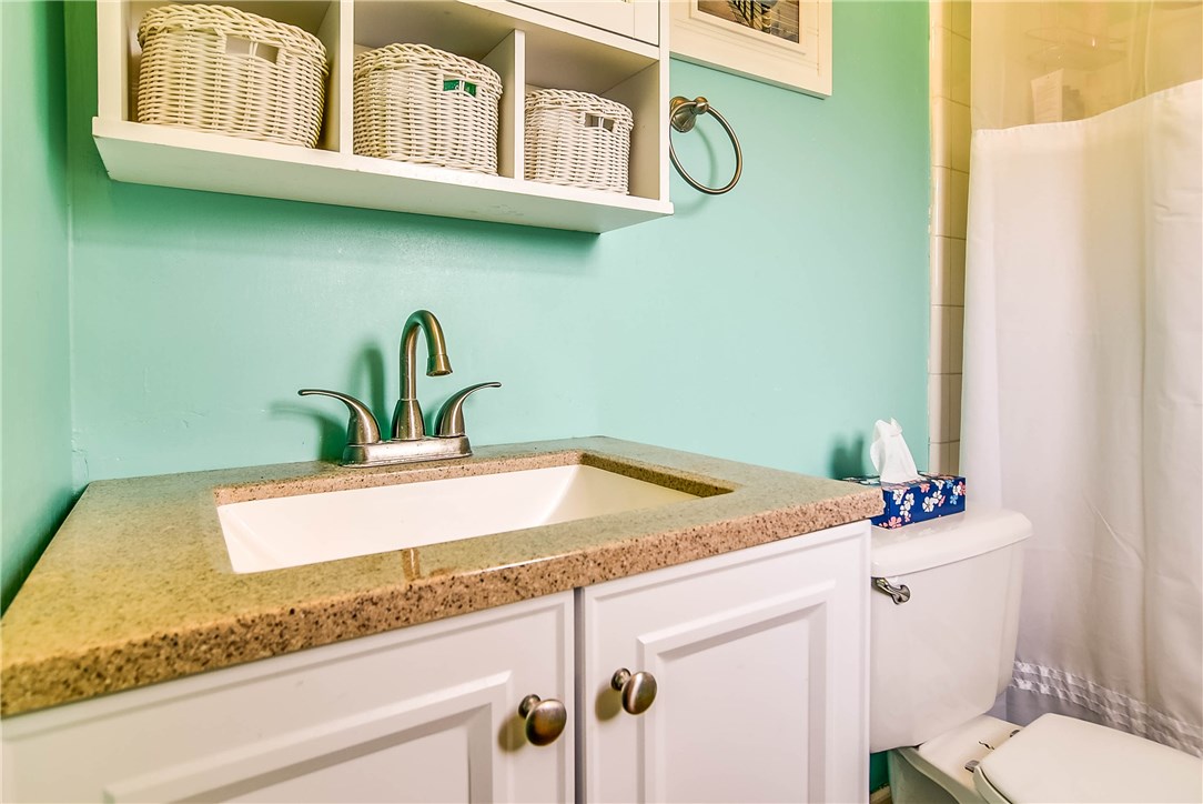 54014 Vikki Road Callahan, FL 32011 - Photo 6 of 29 a bathroom with a sink and a mirror