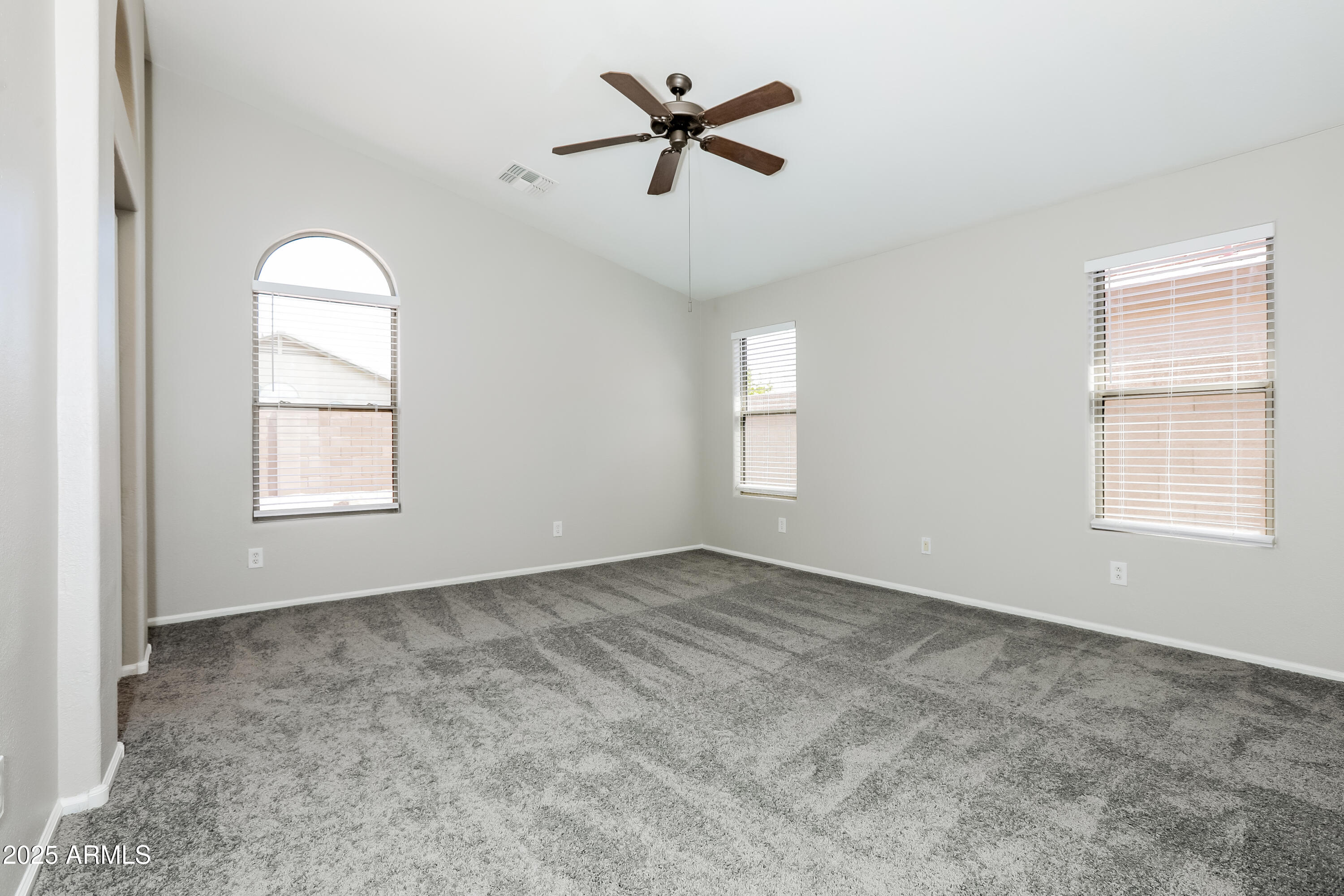 42430 Chambers Drive Maricopa, AZ 85138 - Photo 11 of 15 a view of an empty room with a window