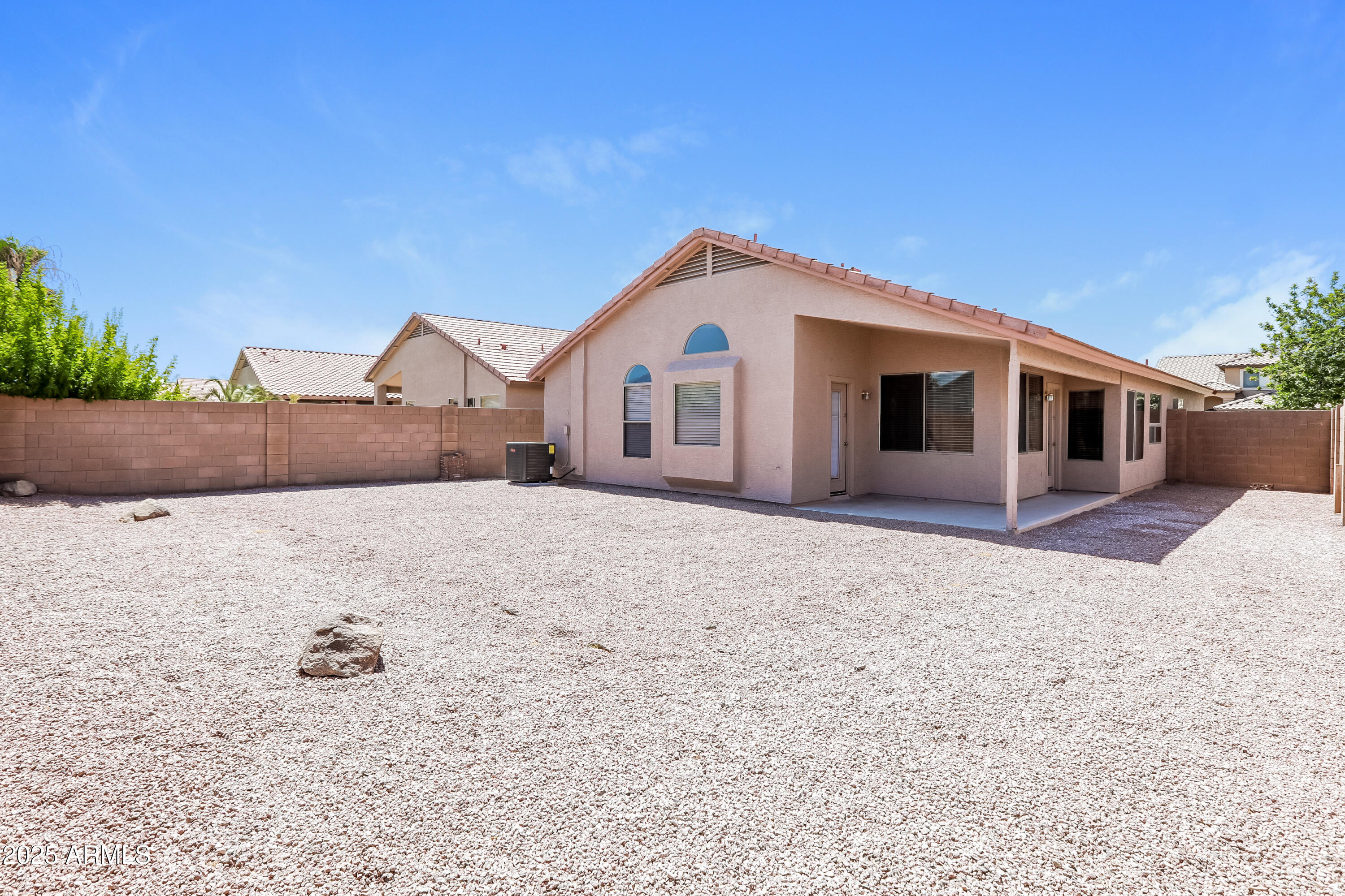 42430 Chambers Drive Maricopa, AZ 85138 - Photo 15 of 15 a view of a house with a yard